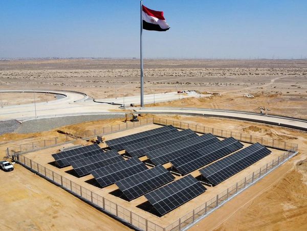 Original MIDAR project photograph showing an Egyptian flag above a PV array.